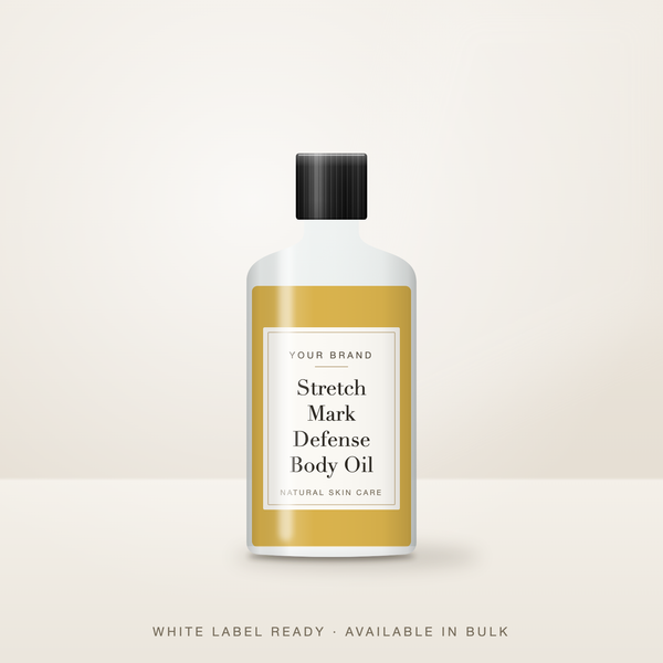 Stretch Mark Body Oil bulk base in an unbranded amber bottle with a Your Brand Here label