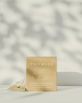 Product packaging with 'Promise' branding on a neutral background
