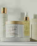 Assorted skincare products with 'Promise' branding on a neutral background