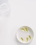 Yellow capsules on a white background