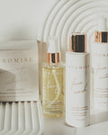 Skincare products with 'Promise' branding on a white surface